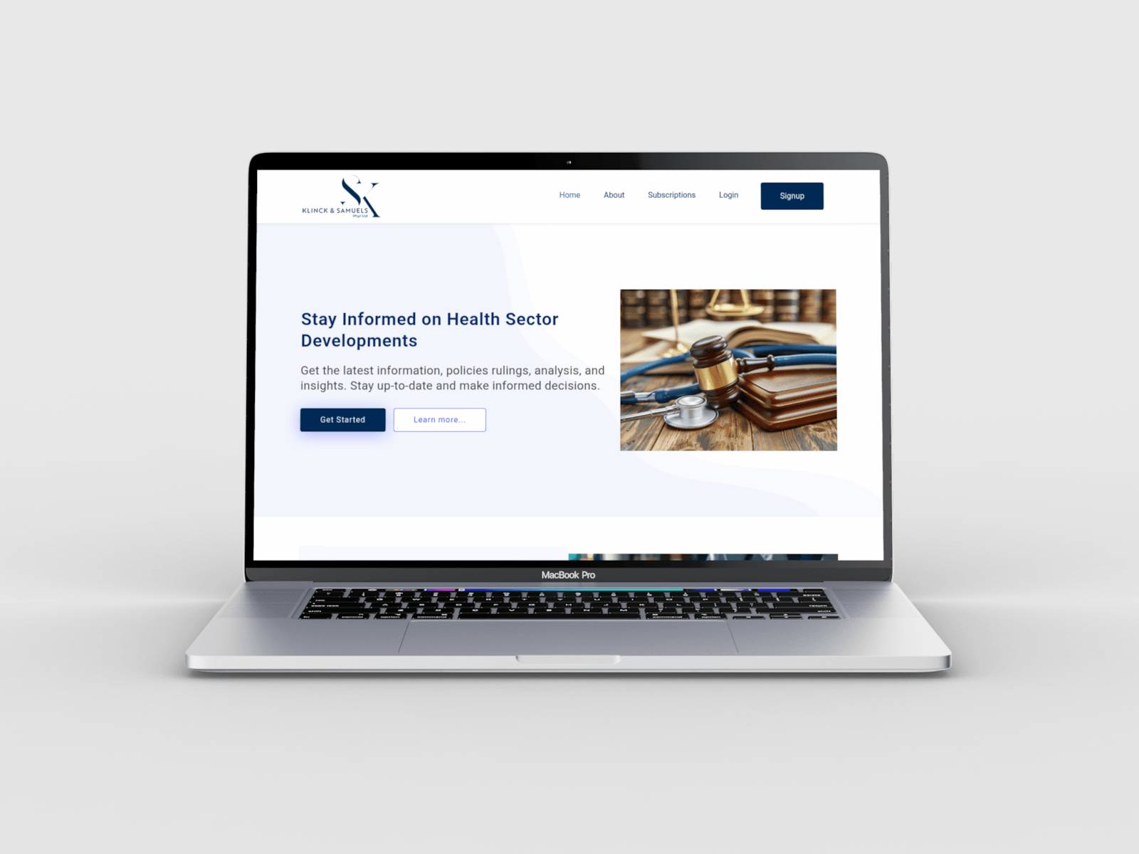A laptop showing the Health Sector Scans homepage.
